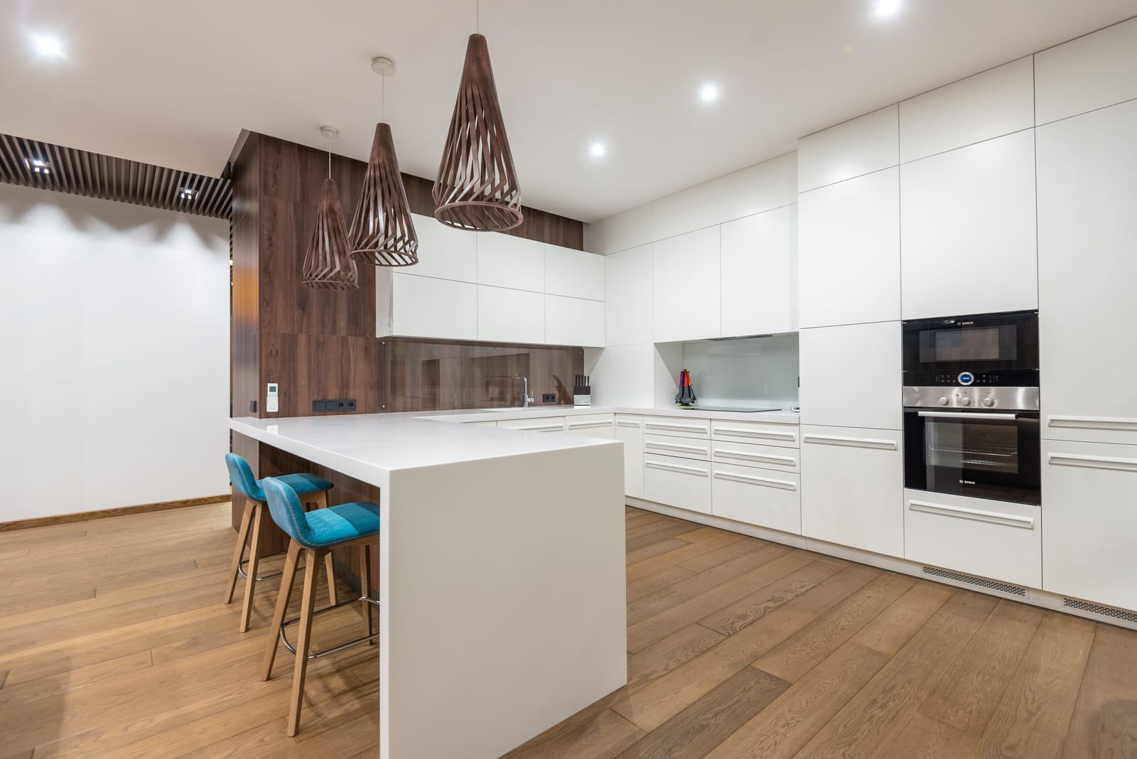 Light engineered wood flooring in a contemporary Las Vegas kitchen