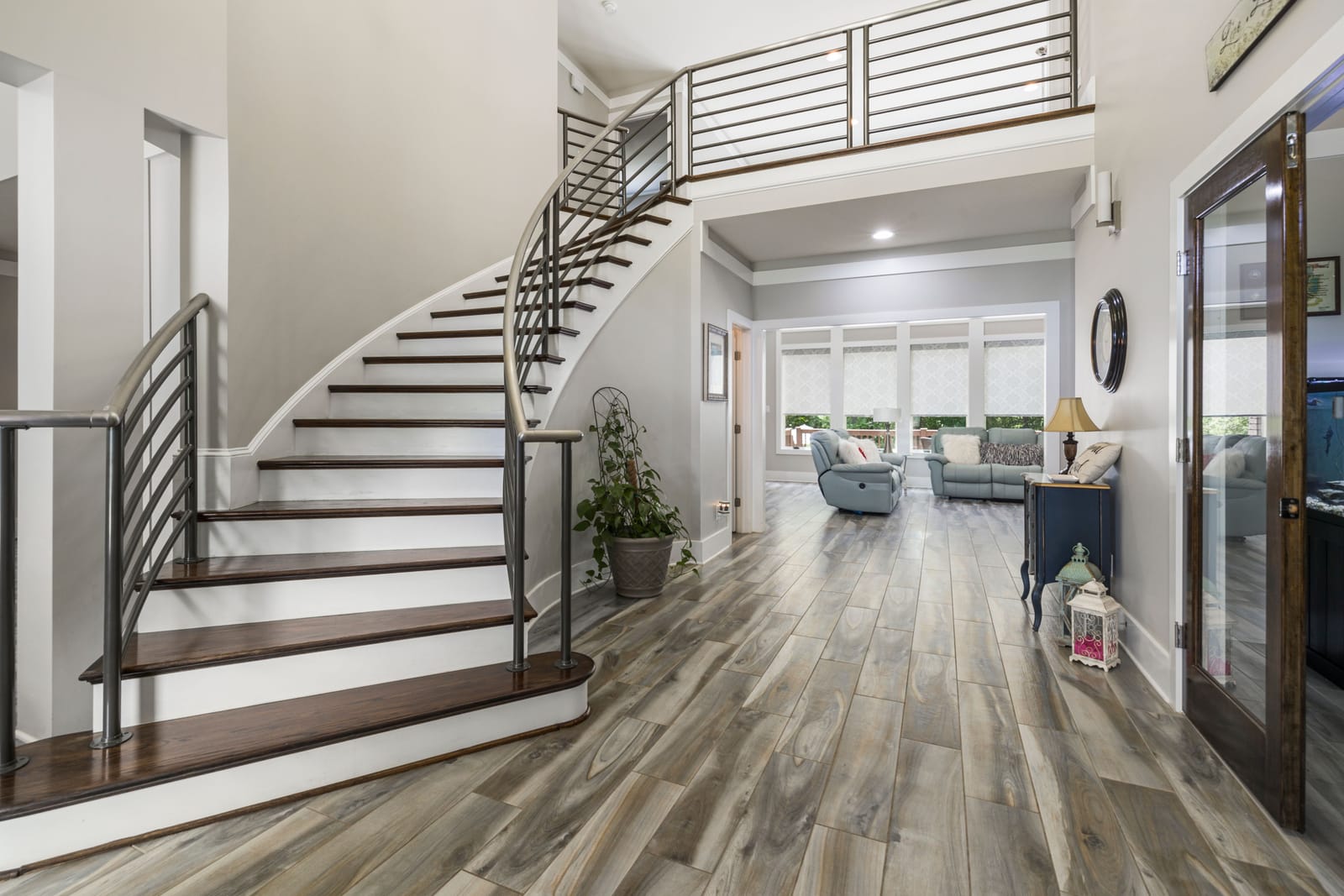 Modern staircase and wood flooring installation serving Enterprise
