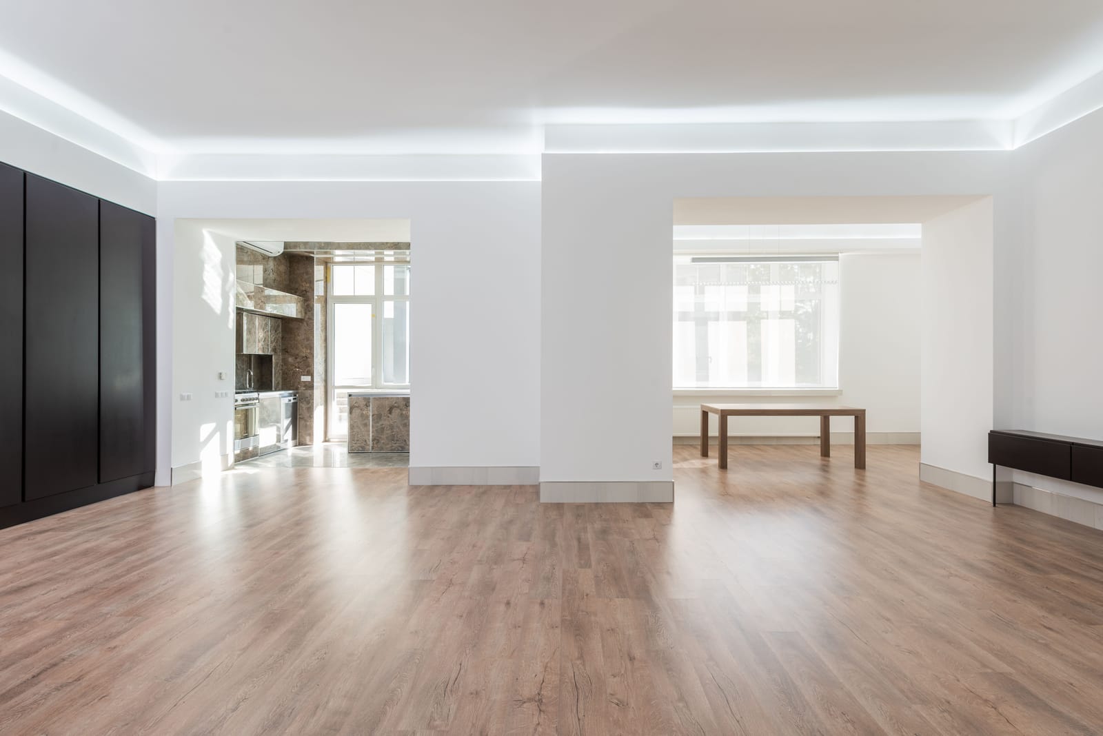 Wide-plank light wood flooring in a bright Las Vegas room suited to the desert climate